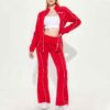 Ladies' hooded tracksuit. Smooth, slightly textured fabric, likely polyester blend. Close-fitting design with clean stitching