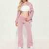 Ladies' hooded tracksuit. Smooth, slightly textured fabric, likely polyester blend. Close-fitting design with clean stitching