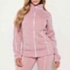 Ladies' hooded tracksuit. Smooth, slightly textured fabric, likely polyester blend. Close-fitting design with clean stitching