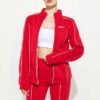 Ladies' hooded tracksuit. Smooth, slightly textured fabric, likely polyester blend. Close-fitting design with clean stitching