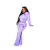 Ladies tracksuit set. Fitted jogger pants & zip-up jacket. Blush pink hue, subtle ribbed texture, clean stitching detail. Fit