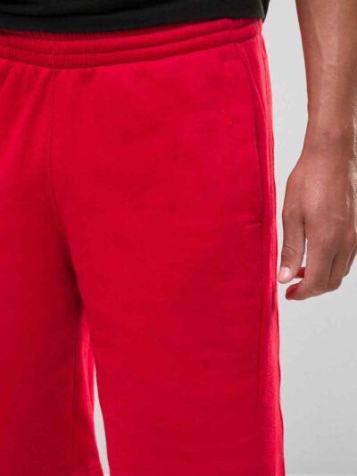 Lightweight organic cotton summer shorts in a relaxed fit. Notice the neat stitching and textured weave. Perfect casual wear