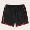 Crimson mesh basketball shorts, textured weave visible. White trim accents. Reinforced stitching. Breathable sport uniform ga
