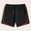 Crimson mesh basketball shorts, textured weave visible. White trim accents. Reinforced stitching. Breathable sport uniform ga