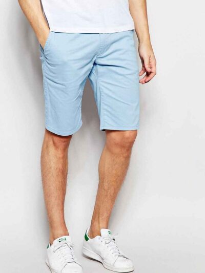 Vibrant Hawaiian print swim board shorts with a slightly textured, quick-dry fabric. Notice the reinforced stitching and comf