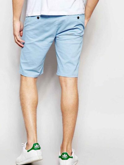 Vibrant Hawaiian print swim board shorts with a slightly textured, quick-dry fabric. Notice the reinforced stitching and comf