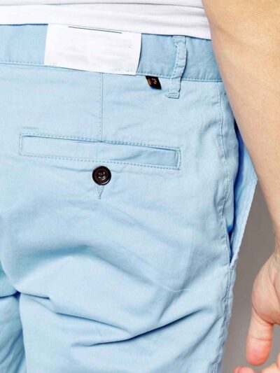 Vibrant Hawaiian print swim board shorts with a slightly textured, quick-dry fabric. Notice the reinforced stitching and comf