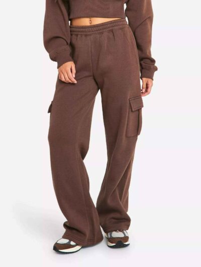Women's two-piece tracksuit. Soft heather gray fabric, ribbed cuffs. Casual sweat suit with clean stitching and a comfortable