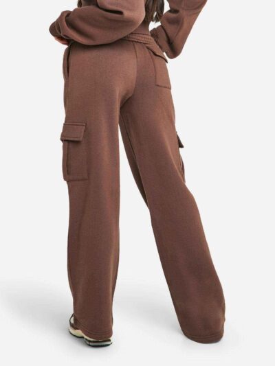 Women's two-piece tracksuit. Soft heather gray fabric, ribbed cuffs. Casual sweat suit with clean stitching and a comfortable