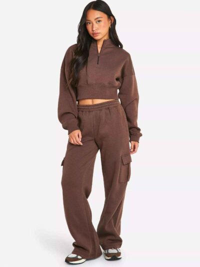 Women's two-piece tracksuit. Soft heather gray fabric, ribbed cuffs. Casual sweat suit with clean stitching and a comfortable