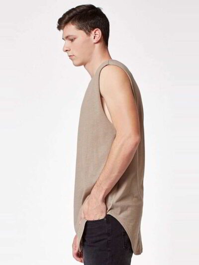 Close-up of a finely stitched, breathable singlet. Soft, slightly textured knit fabric in vibrant turquoise. Sporty, sleevele
