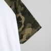 Close-up of a custom-printed t-shirt. Soft jersey knit texture, clean seams. Noticeable print quality, vibrant colors on a da