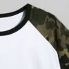 Close-up of a custom-printed t-shirt. Soft jersey knit texture, clean seams. Noticeable print quality, vibrant colors on a da