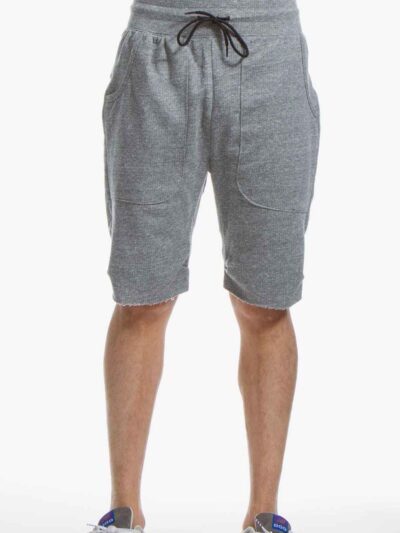 Washed cotton shorts in faded blue. Relaxed fit, visible stitching detail. High-street fashion essential for clothing startup
