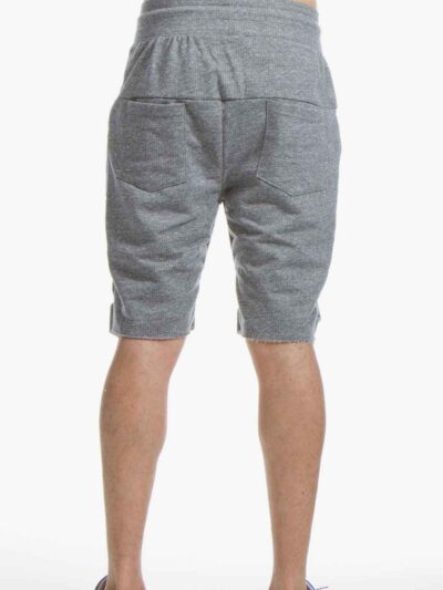 Washed cotton shorts in faded blue. Relaxed fit, visible stitching detail. High-street fashion essential for clothing startup