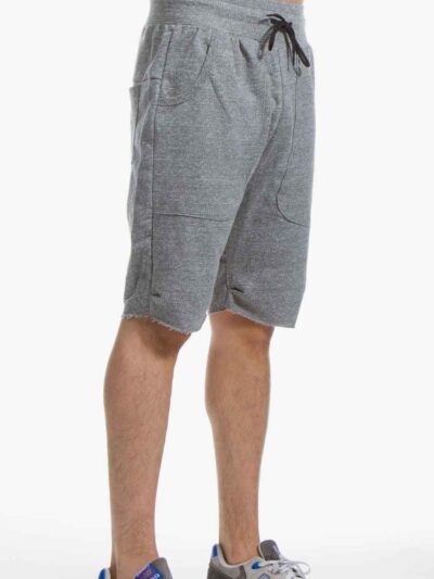 Washed cotton shorts in faded blue. Relaxed fit, visible stitching detail. High-street fashion essential for clothing startup