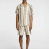 Vintage men's streetwear short set in washed cotton. Relaxed fit, visible stitching, slightly faded effect for a lived-in loo