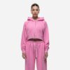 Women's tracksuit set in muted tones. Visible fine stitching, soft-looking knit fabric. Corporate uniform or team wear. - Vie