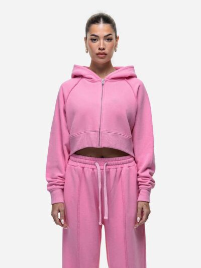 Women's tracksuit set in muted tones. Visible fine stitching, soft-looking knit fabric. Corporate uniform or team wear. - Vie