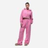Women's tracksuit set in muted tones. Visible fine stitching, soft-looking knit fabric. Corporate uniform or team wear. - Vie
