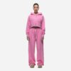 Women's tracksuit set in muted tones. Visible fine stitching, soft-looking knit fabric. Corporate uniform or team wear. - Vie
