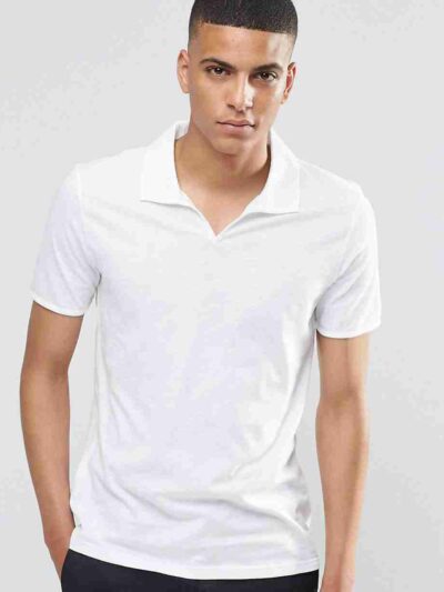 Close-up of open-collar polo shirt; textured fabric, clean stitching, sporty design. Perfect for club uniforms. Team apparel.