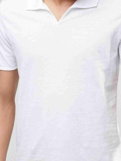 Close-up of open-collar polo shirt; textured fabric, clean stitching, sporty design. Perfect for club uniforms. Team apparel.
