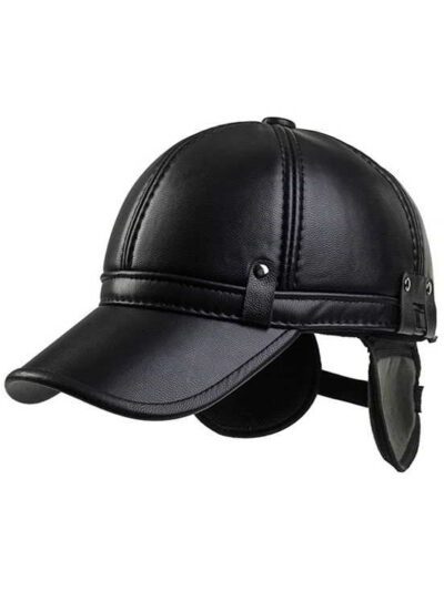 Close-up of a brown golf hat in textured PU leather with earflaps. Adjustable strap visible; fine stitching detail. - View 1