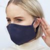 Reusable face mask, soft fabric, visible stitching detail. Breathable medical-style mask, adjustable ear loops for snug fit.