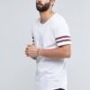 Close-up of blank, custom-printed t-shirts. Notice soft, cotton blend fabric and durable double-needle stitching. Vibrant col