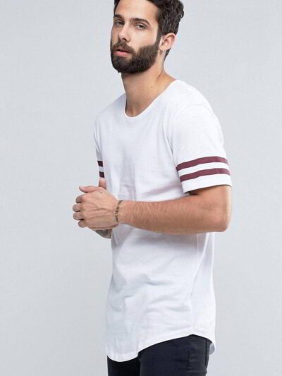Close-up of blank, custom-printed t-shirts. Notice soft, cotton blend fabric and durable double-needle stitching. Vibrant col