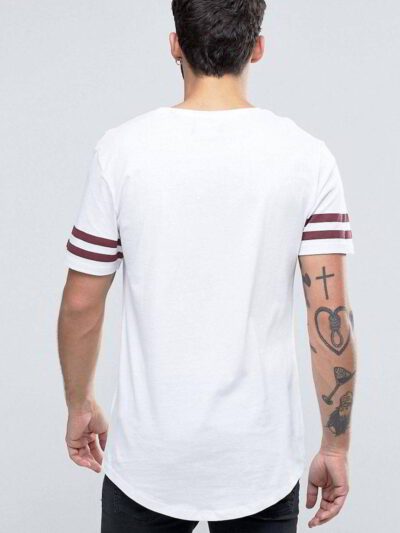 Close-up of blank, custom-printed t-shirts. Notice soft, cotton blend fabric and durable double-needle stitching. Vibrant col