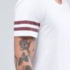 Close-up of blank, custom-printed t-shirts. Notice soft, cotton blend fabric and durable double-needle stitching. Vibrant col