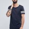 Close-up of blank, custom-printed t-shirts. Notice soft, cotton blend fabric and durable double-needle stitching. Vibrant col