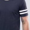 Close-up of blank, custom-printed t-shirts. Notice soft, cotton blend fabric and durable double-needle stitching. Vibrant col