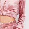 Cropped pink velour tracksuit. Heavyweight fabric, visible plush texture. Luxurious winter set with detailed stitching and a