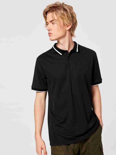 Close-up of a blank polo shirt. Smooth pique knit, clean stitching. Ready for printing, embroidery. Available in various colo
