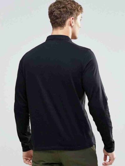 Close-up of cotton polo shirt fabric. Fine knit, smooth texture, durable stitching. Perfect blank canvas for custom designs.