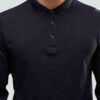Close-up of cotton polo shirt fabric. Fine knit, smooth texture, durable stitching. Perfect blank canvas for custom designs.
