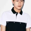 Close-up of a plain polo shirt. Soft, pique knit texture, clean stitching. Available in bulk for custom printing projects. -