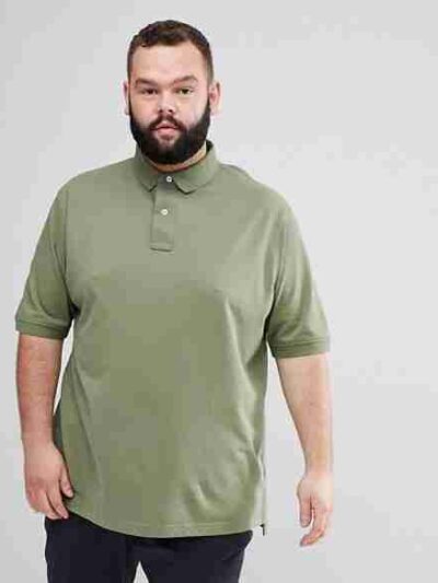 Plus size polo shirt, premium cotton pique knit. Clean, tailored fit, subtle texture. Note reinforced stitching at collar. So