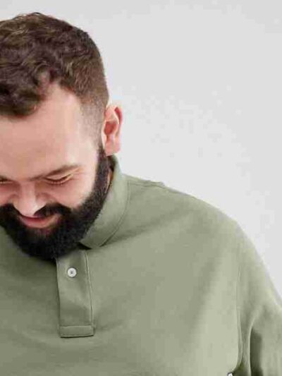 Plus size polo shirt, premium cotton pique knit. Clean, tailored fit, subtle texture. Note reinforced stitching at collar. So