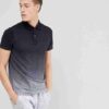 Close-up of a polo shirt, embroidered logo detail. Soft, fine knit fabric texture. High-quality stitching visible. Premium fe