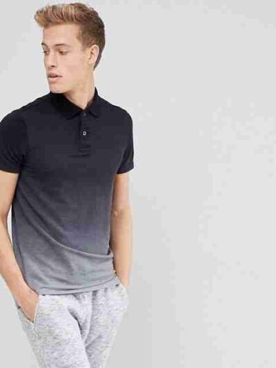 Close-up of a polo shirt, embroidered logo detail. Soft, fine knit fabric texture. High-quality stitching visible. Premium fe