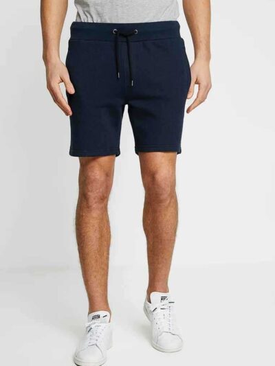 Men's street fashion short set: crisp, lightweight fabric with subtle textured weave. Clean stitching, modern fit. Relaxed, u