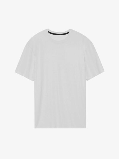 Men's two-piece short set. Textured, lightweight fabric, likely cotton blend. Matching top and shorts. Sharp, visible stitchi