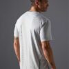 Men's two-piece short set. Textured, lightweight fabric, likely cotton blend. Matching top and shorts. Sharp, visible stitchi