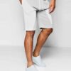 Lightweight summer shorts in a soft, textured fabric. Notice the clean stitching and relaxed fit, perfect for warm weather. C