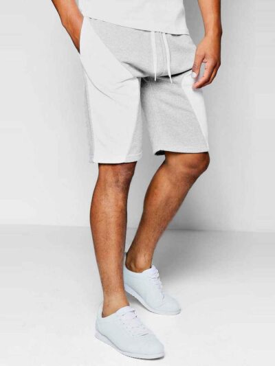 Lightweight summer shorts in a soft, textured fabric. Notice the clean stitching and relaxed fit, perfect for warm weather. C