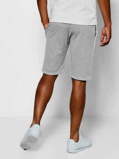 Lightweight summer shorts in a soft, textured fabric. Notice the clean stitching and relaxed fit, perfect for warm weather. C